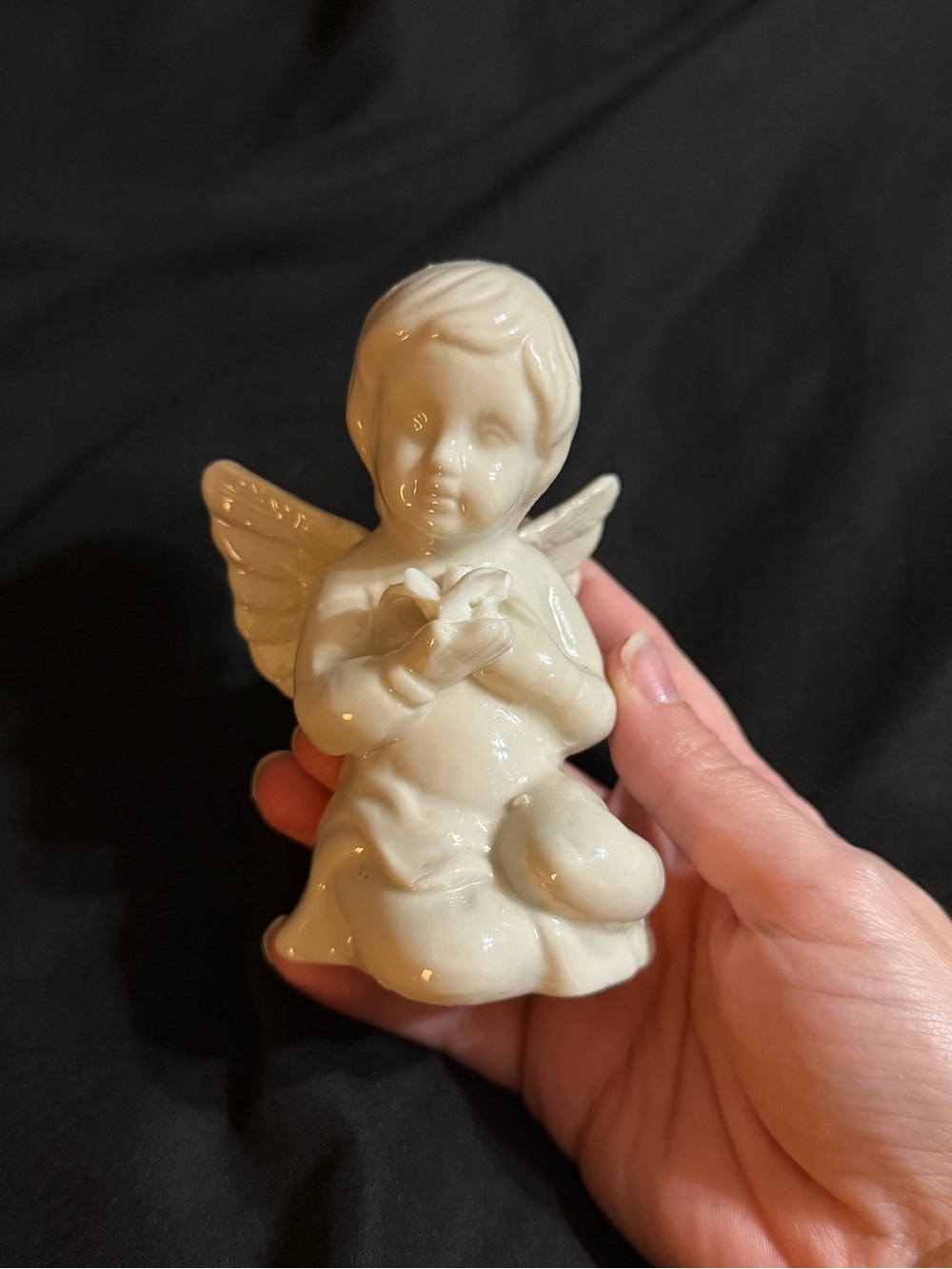 Porcelain Cherub Figurine in Cream